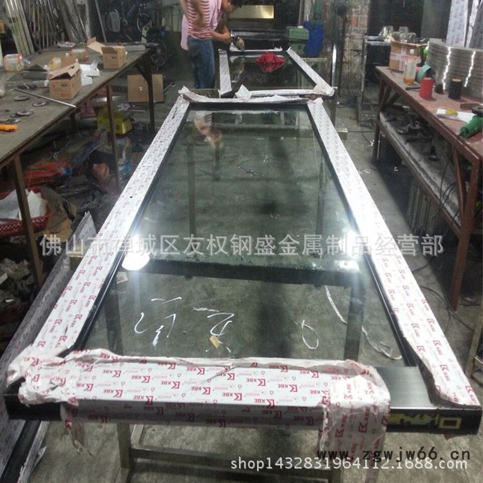 星级酒店地弹簧黑钛金不锈钢玻璃门   饭店玫瑰金推拉门图3