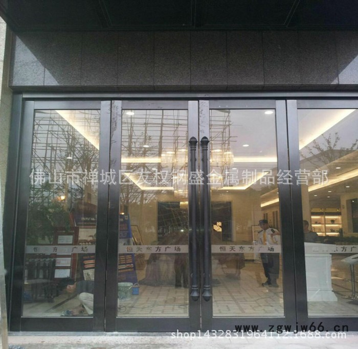 星级酒店地弹簧黑钛金不锈钢玻璃门   饭店玫瑰金推拉门图2