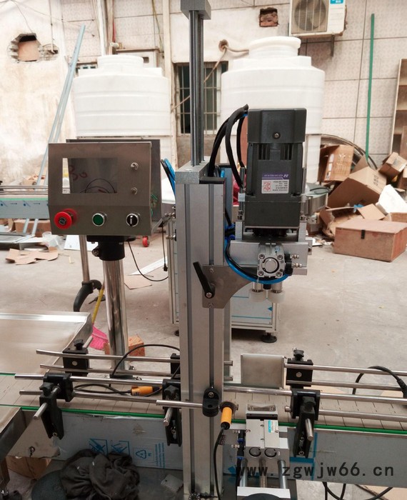 广州机械多功能自动鸭嘴式/喷头式锁盖/全自动灌装旋盖机图2