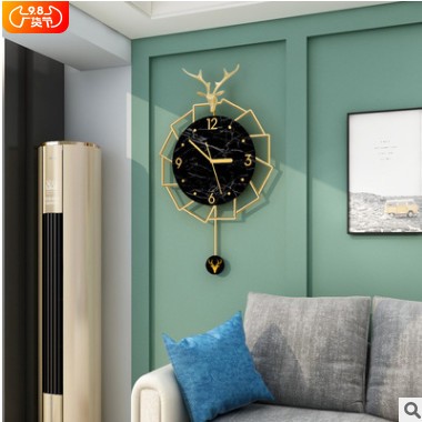 新品挂墙钟表北欧现代简约轻奢挂钟时尚鹿形装饰居家客厅跨境壁钟图3